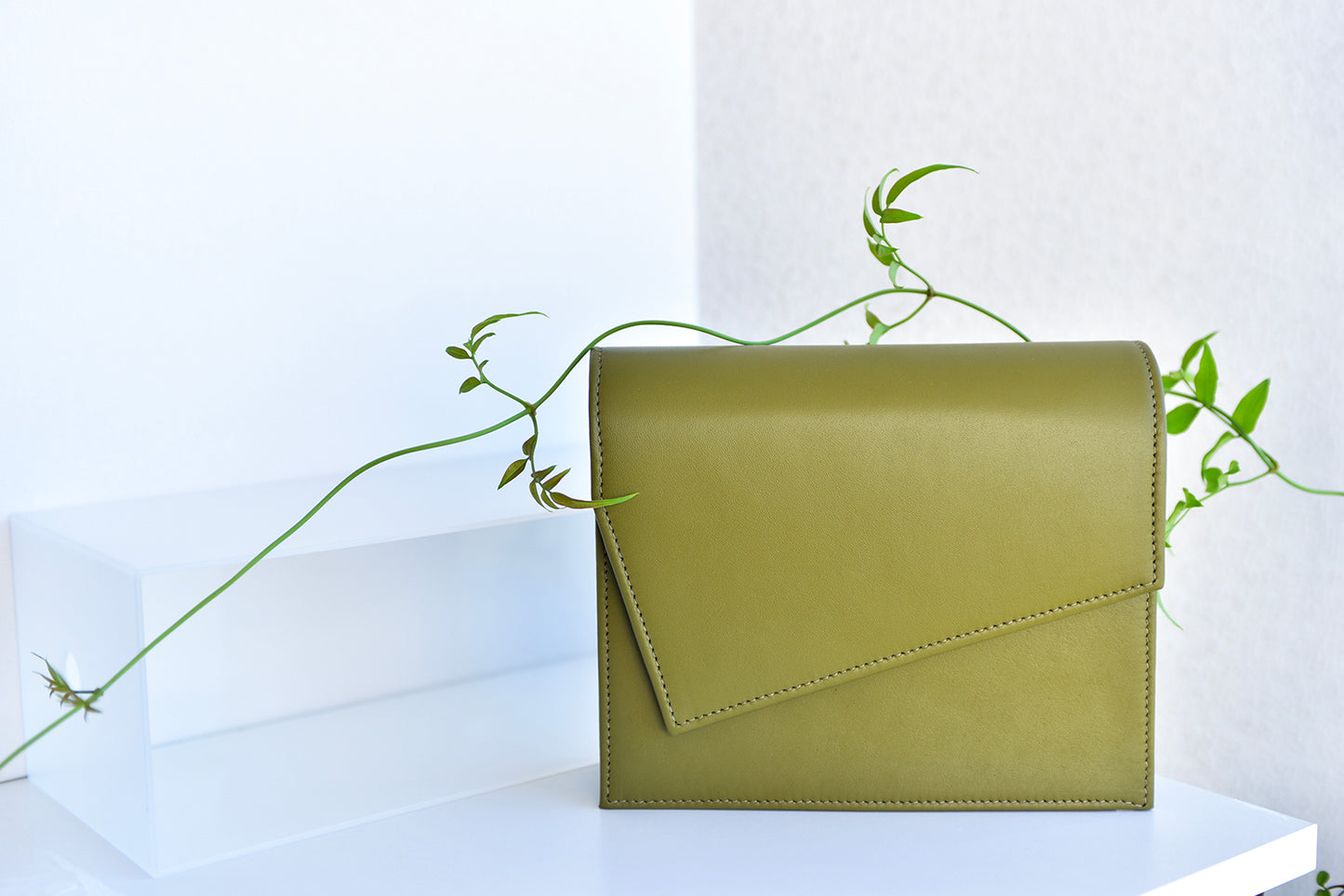 Olive green leather clutch handbag