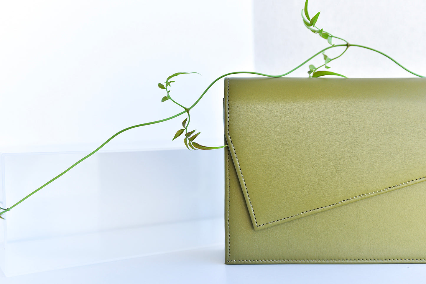 Olive green leather clutch handbag