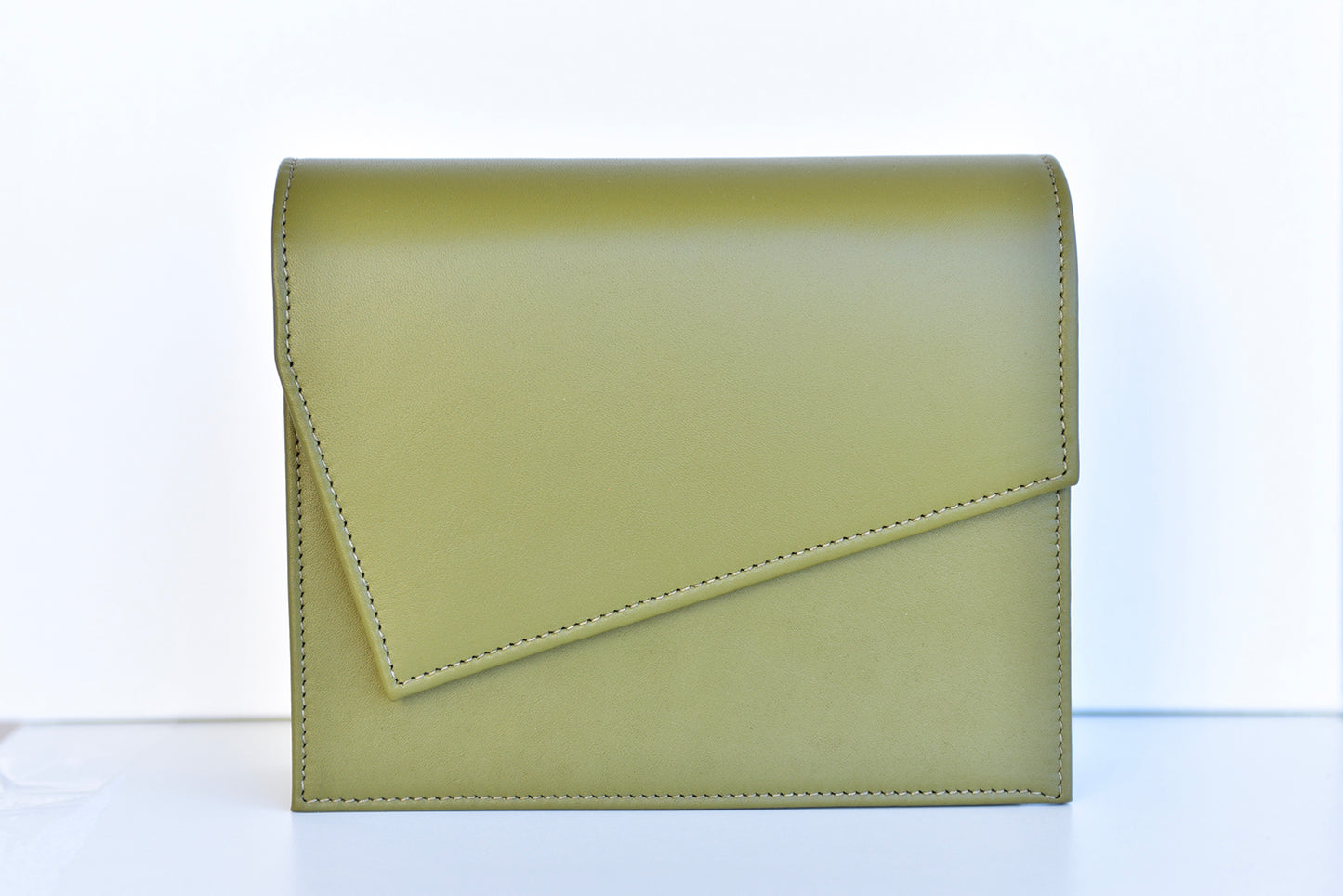 Olive green leather clutch handbag