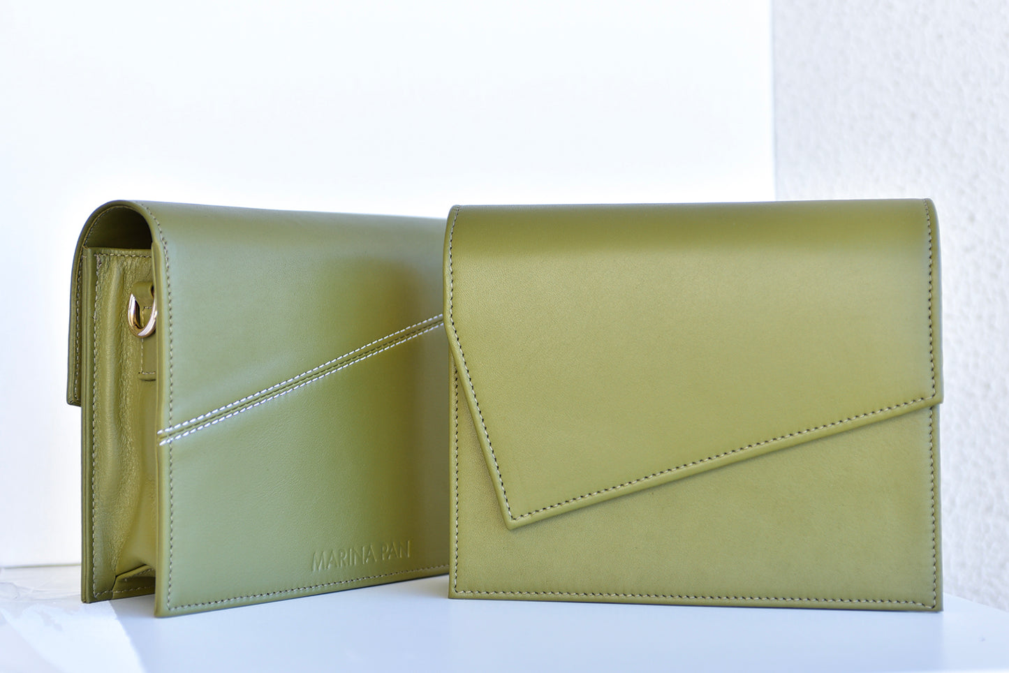 Olive green leather clutch handbag