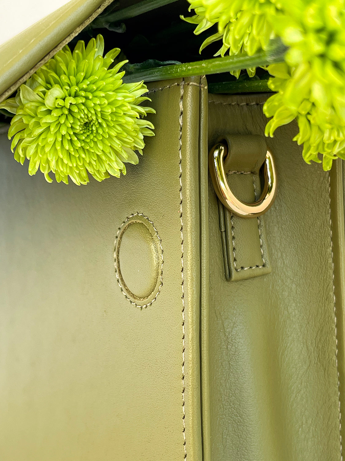 Olive green leather clutch handbag