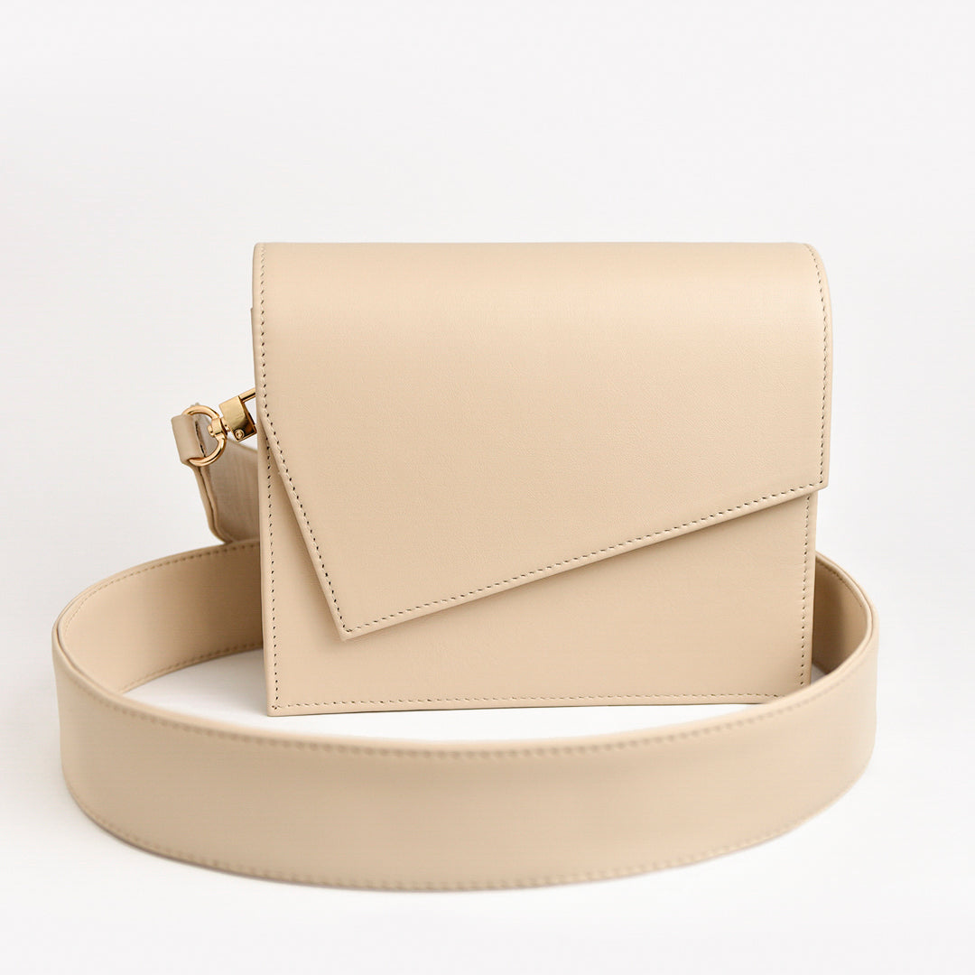 Beige leather 2025 clutch bag