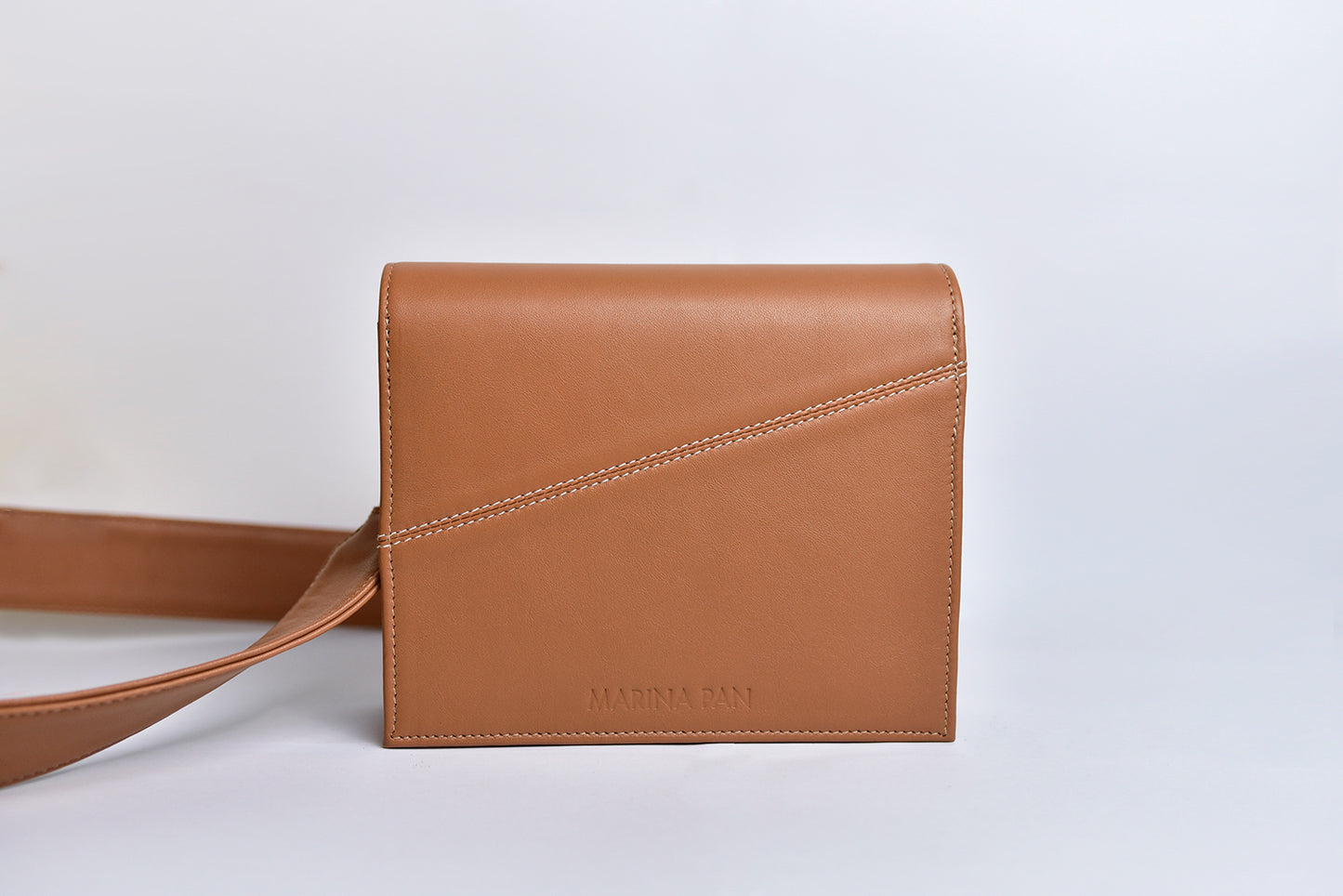 Brown clutch bag